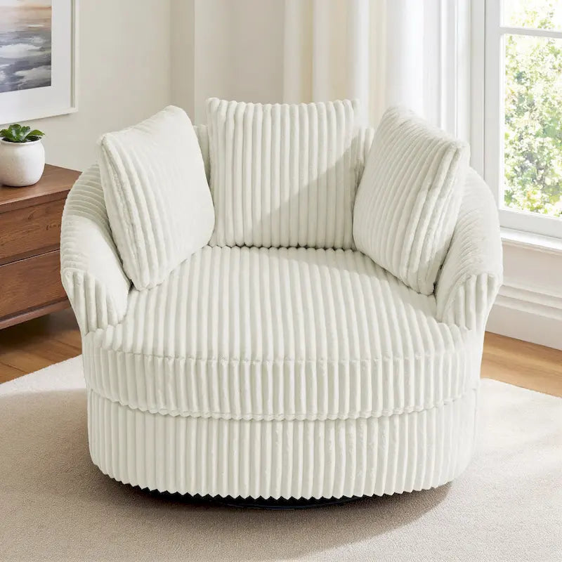 Fauteuil crapaud pivotant déhoussable à accoudoirs encastrés